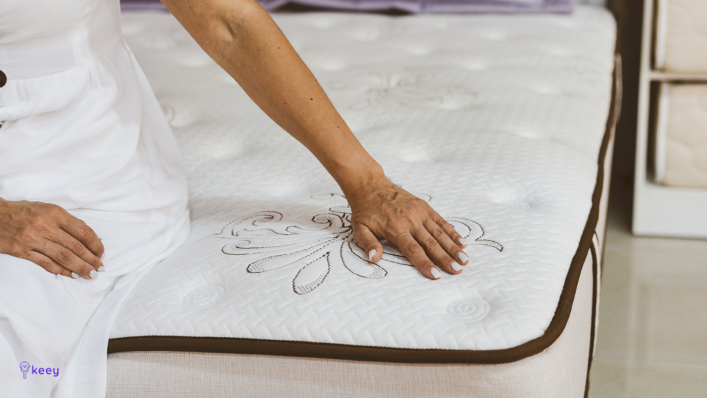 woman testing a mattress